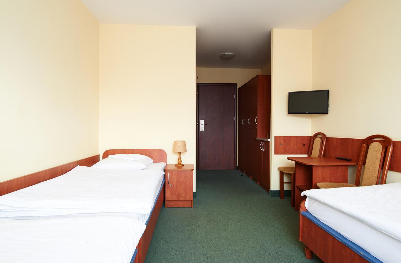 Obiekt Hotelarski Patron Warschau Zimmer foto